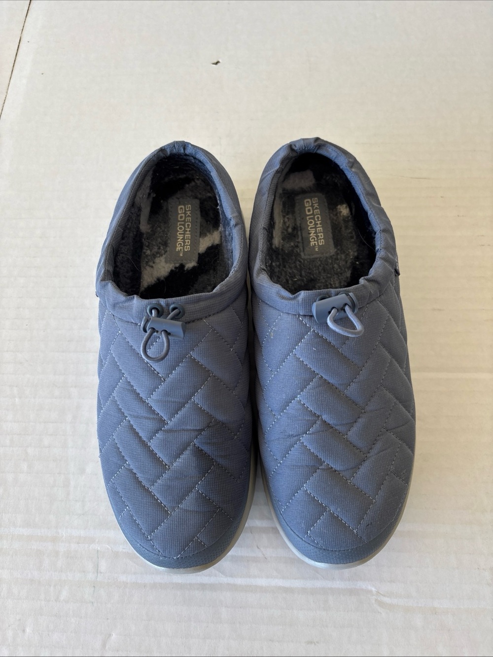 Skechers Quilted Slip-On Loafers in Blue Gray